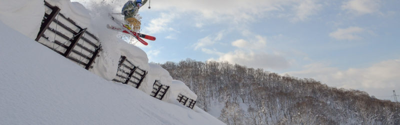 Jackson Sloss sending it off an avalanche barrier