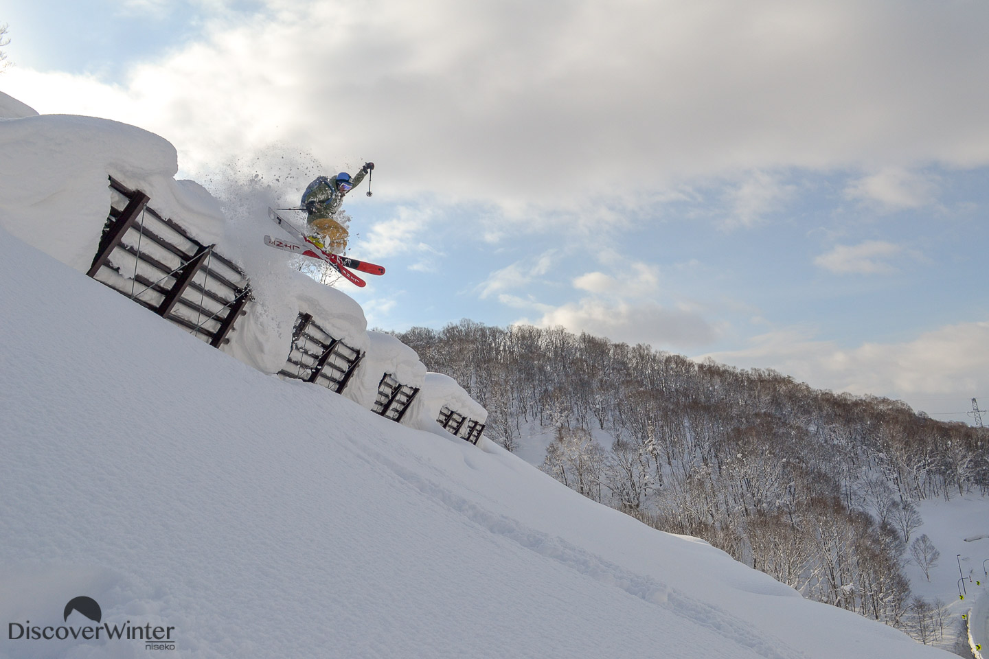 Jackson Sloss sending it off an avalanche barrier